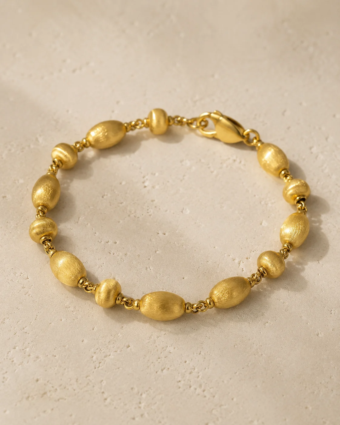 Bracciale rigido in oro giallo 18 kt