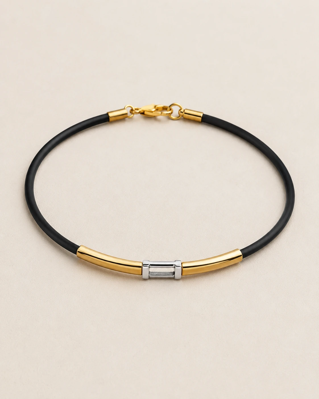 Bracciale bicolore in oro 18 kt e caucciù