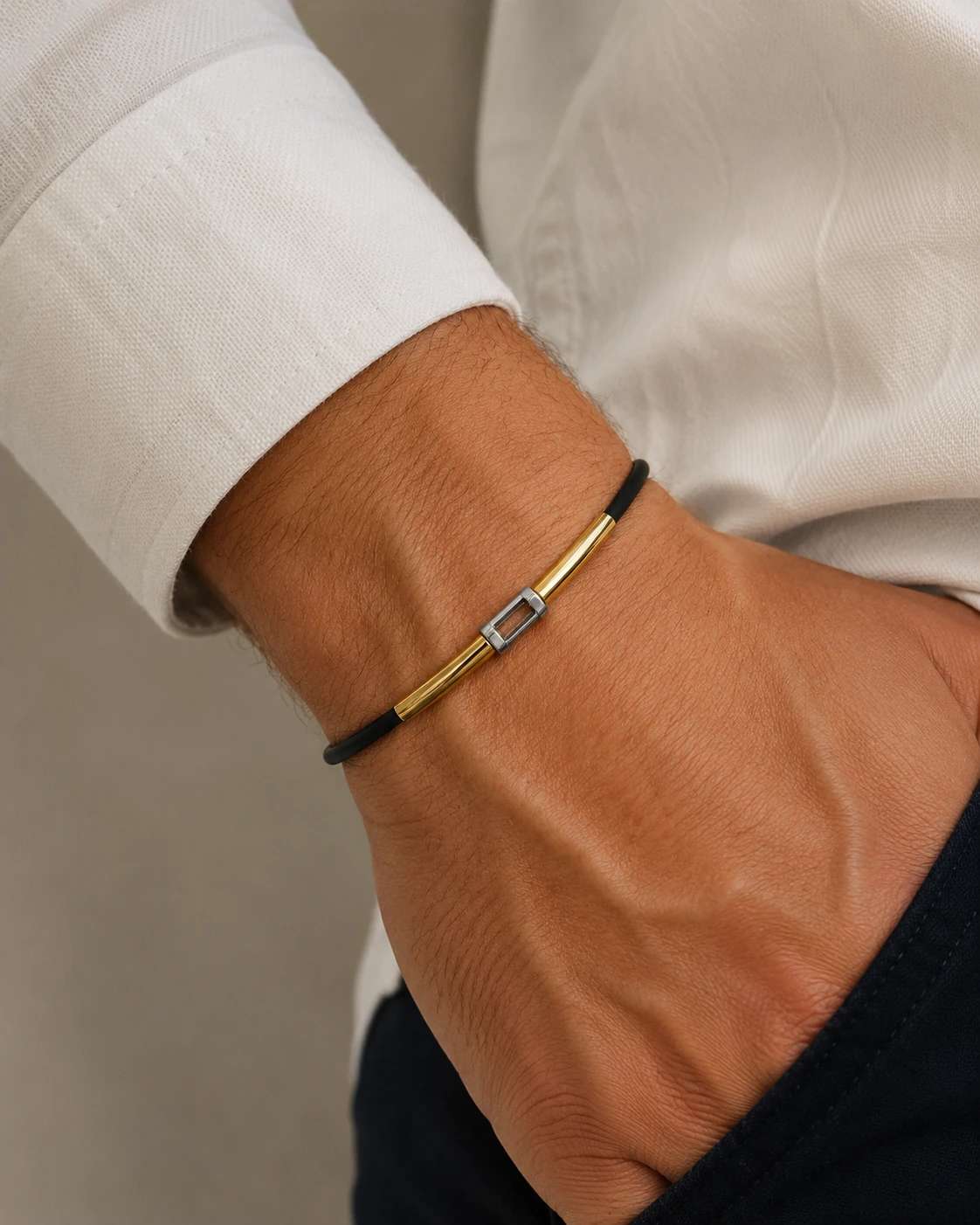 Bracciale bicolore in oro 18 kt e caucciù