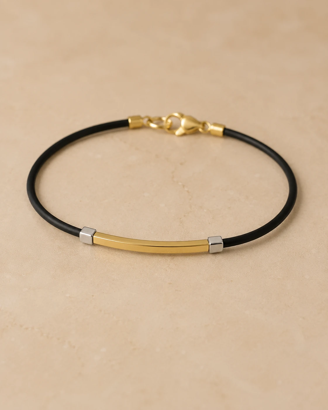 Bracciale bicolore in oro 18 kt e caucciù