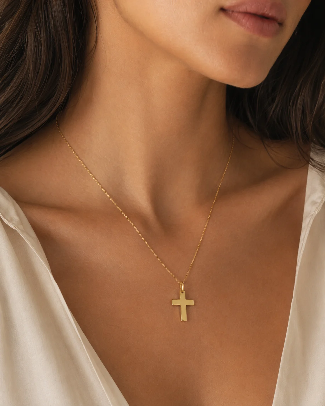 Croce in oro giallo 18 kt