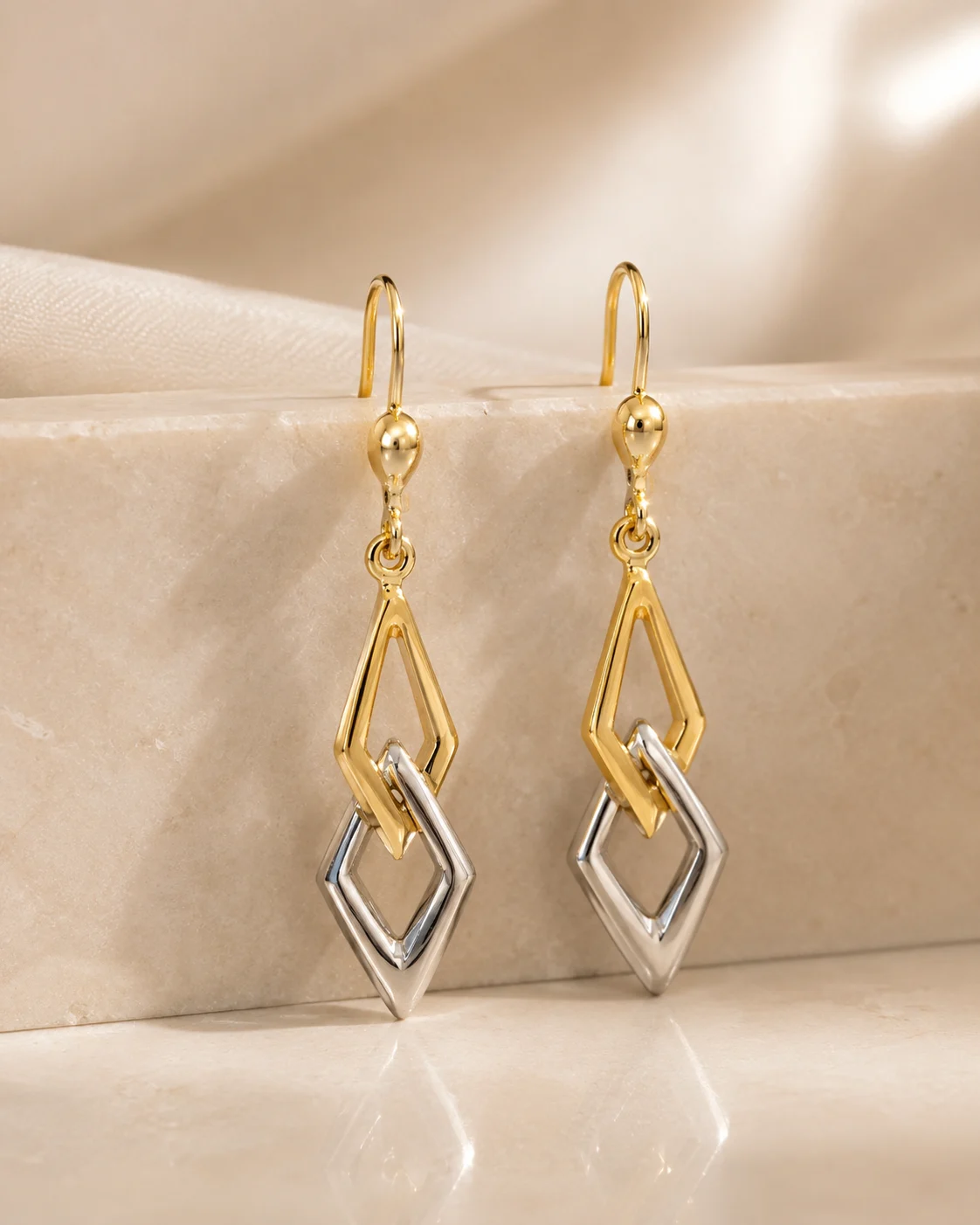 Orecchini pendenti bicolori in oro 18 kt