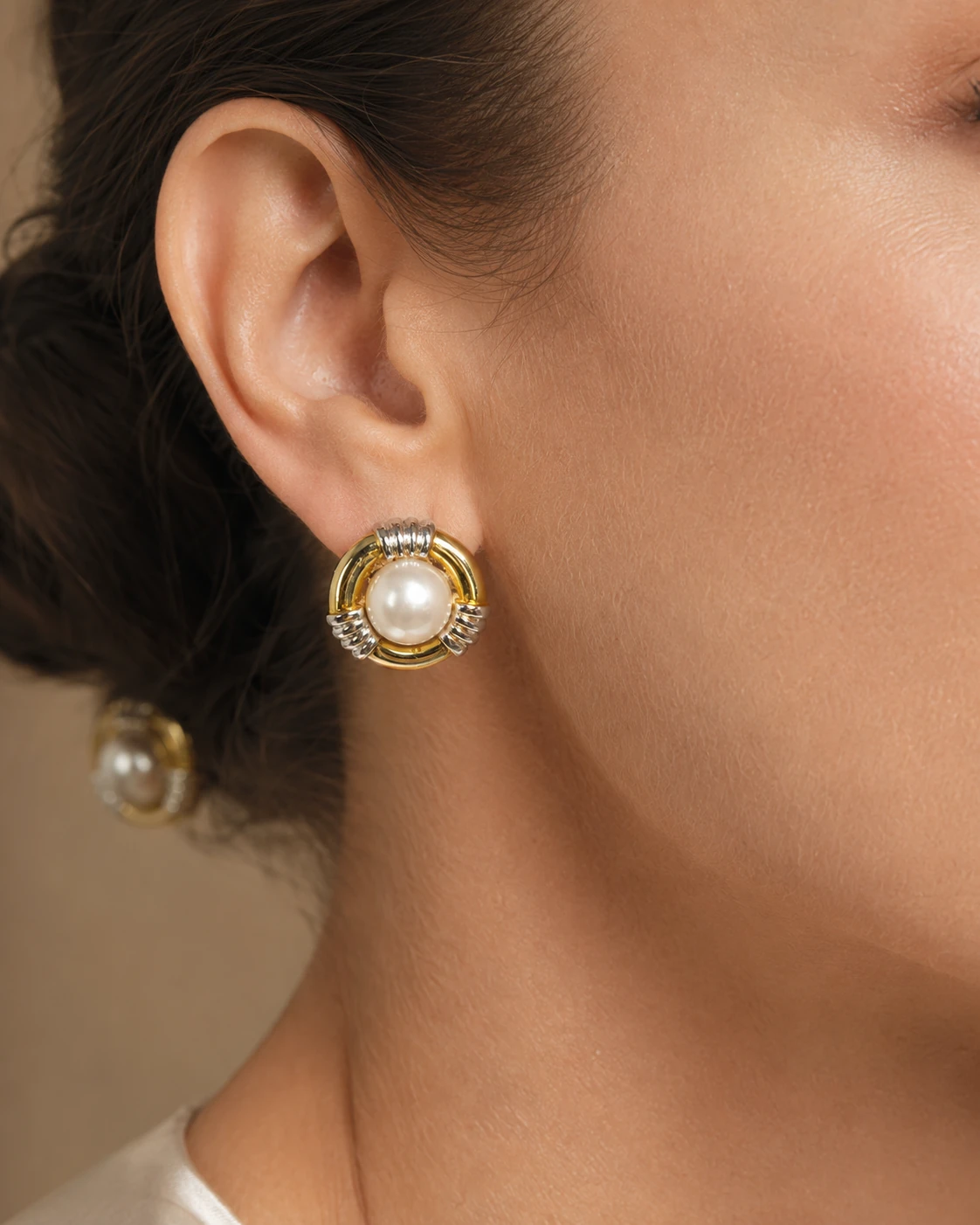 Orecchini in oro bicolore 18 kt e perla coltivata